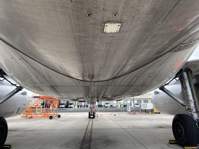 Underbody of a Boeing airplane with dirt, turbine exhaust, etc.